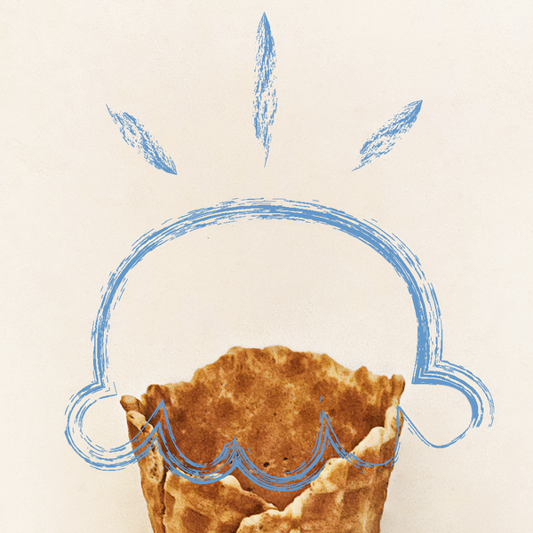 A single waffle cone filled with brown ice cream, centered on a plain off-white background. A light blue hand-drawn outline of a face and small sparkles appears above the cone. The photo for the ice cream is coming soon, and this is a placeholder illustration.